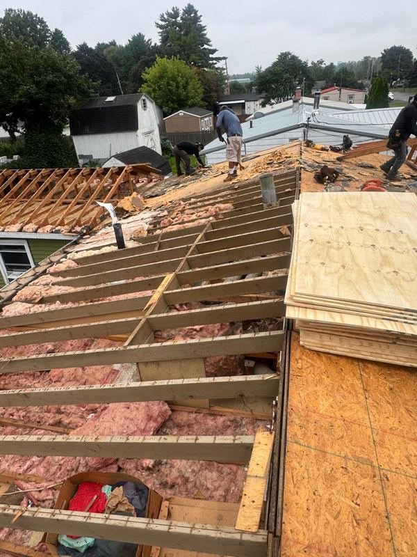 Tear-off and roof rebuild in progress