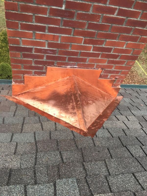 New copper chimney flashing