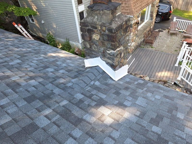 Flashing around a stone chimney