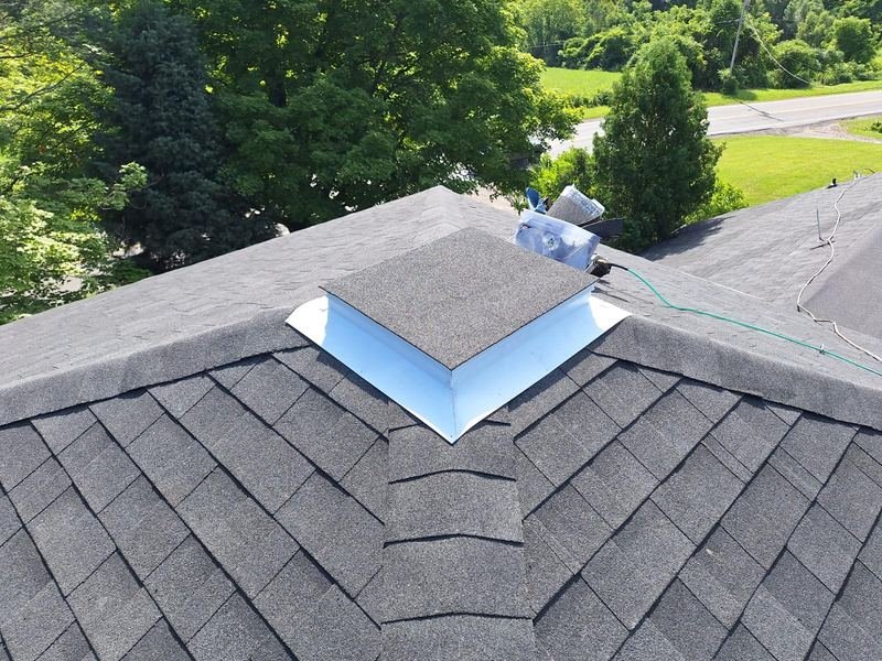 Flashing detail on a shingle roof