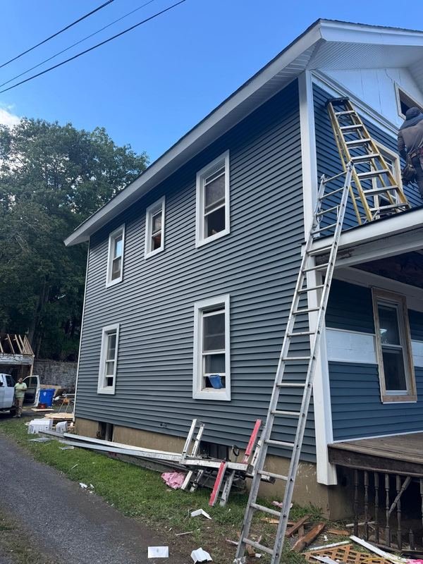 Home exterior during roof work
