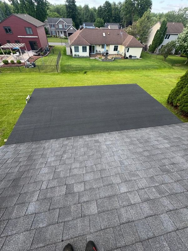 Shingle and low-slope roof combination