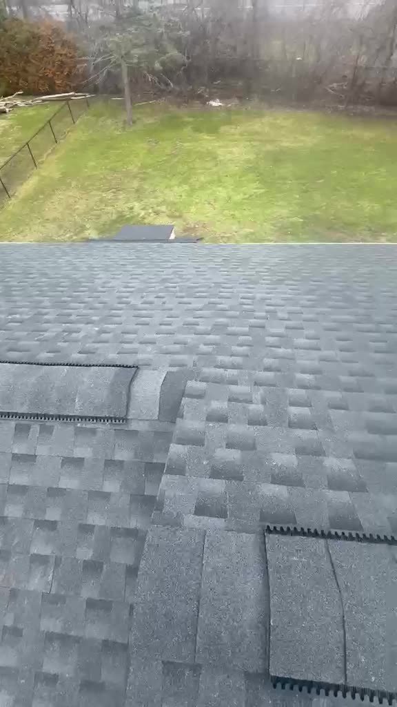 Vannyss Roofing crew working on a roof — project video 6