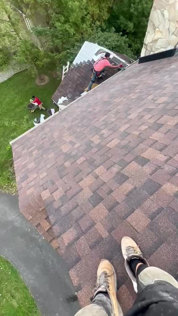 Vannyss Roofing crew working on a roof — project video 19